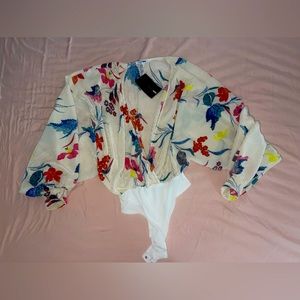 FASHION NOVA “Laying On Flower Bodysuit “ Size Medium. BRAND NEW.